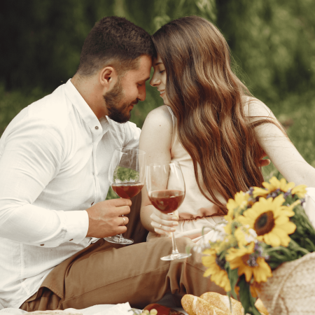 couple-field-brunette-white-dress-pair-sitting-grass (1)